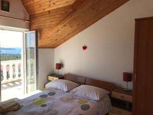 Postel nebo postele na pokoji v ubytování Apartment Santa Marina