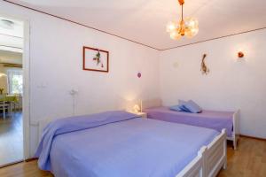 Postel nebo postele na pokoji v ubytování Apartment Carmen