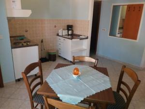 Kuchyň nebo kuchyňský kout v ubytování Apartmani Nina