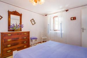 Postel nebo postele na pokoji v ubytování Apartment Carmen