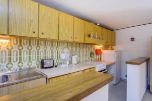 Kuchyň nebo kuchyňský kout v ubytování Apartment Carmen