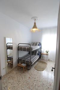 Posteľ alebo postele v izbe v ubytovaní Alojamiento Armenia Piscina