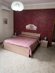 Posteľ alebo postele v izbe v ubytovaní Case vacanze LE ROSE