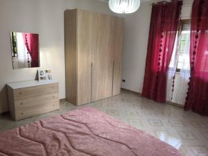 Posteľ alebo postele v izbe v ubytovaní Case vacanze LE ROSE