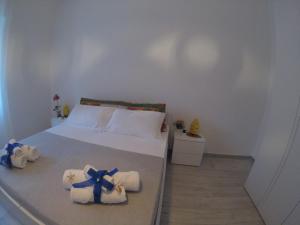 Posteľ alebo postele v izbe v ubytovaní Oudeis Holidays Apartments Tropea