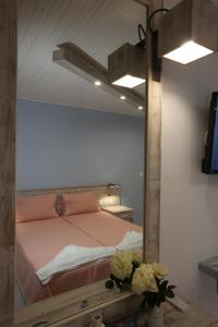 A bed or beds in a room at Bella Vista