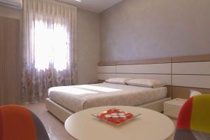 Postel nebo postele na pokoji v ubytování Luxury B&B Coccolhouse
