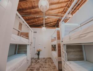 Posteľ alebo postele v izbe v ubytovaní 4U Hostel