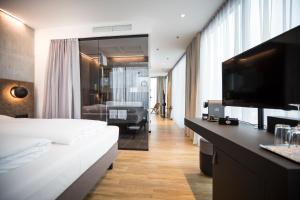 Łóżko lub łóżka w pokoju w obiekcie arte Hotel Salzburg