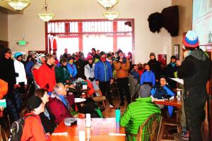 a group of people standing in a room with a crowd at Grand Imperial Hotel in Silverton