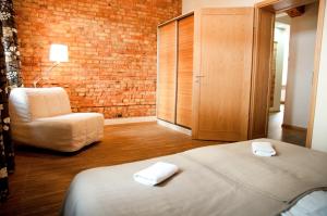 Łóżko lub łóżka w pokoju w obiekcie Apartamenty 23
