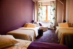 Łóżko lub łóżka w pokoju w obiekcie Apartamenty 23