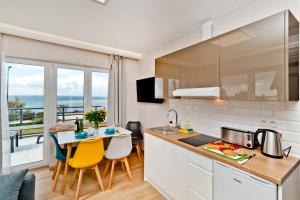 Kuchyňa alebo kuchynka v ubytovaní Apartamenty.in Chałupy