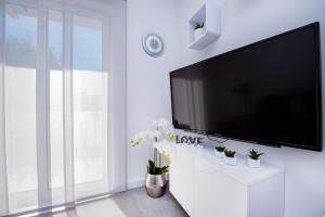 TV a/nebo společenská místnost v ubytování Holiday Magic