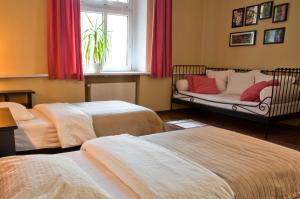 Łóżko lub łóżka w pokoju w obiekcie Apartamenty 23