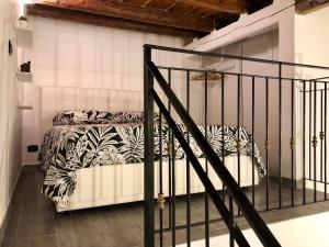 Postel nebo postele na pokoji v ubytování Corte Del Carmine