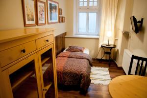 Łóżko lub łóżka w pokoju w obiekcie Apartamenty 23