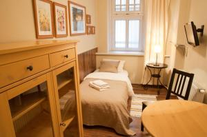 Łóżko lub łóżka w pokoju w obiekcie Apartamenty 23