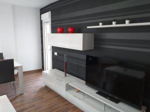 TV a/nebo společenská místnost v ubytování EAST WIND