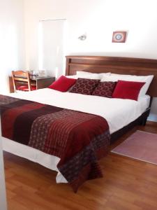 Rúm í herbergi á B&B Hostel CasaMoro