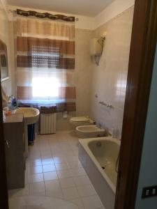 Kúpeľňa v ubytovaní Case vacanze LE ROSE