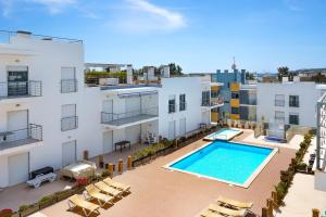 an aerial view of a building with a swimming pool at Blue Ocean House in Lagos