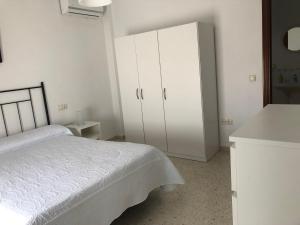 Posteľ alebo postele v izbe v ubytovaní 3 Calle Margarita Nelken
