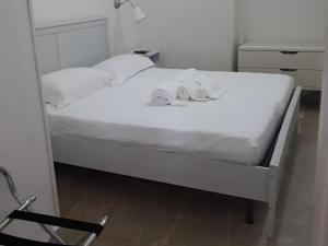 Posteľ alebo postele v izbe v ubytovaní La Rosa dei Sassi 2