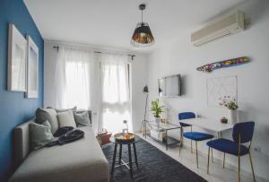 a living room with a couch and a table at Apartments Lucija in Zadar
