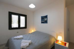 Ein Bett oder Betten in einem Zimmer der Unterkunft R&Z Getaway