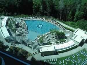 an aerial view of a swimming pool in a yard at The Fox Tower at Foxwoods in Ledyard Center