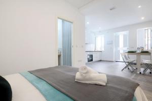 Postel nebo postele na pokoji v ubytování Acogedor LOFT en Bajo CENTRICO CON PARKING WIFI + 25 fotografií