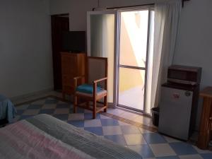 Postel nebo postele na pokoji v ubytování Yucatan Vista Inn Guest House