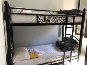 Uma cama ou camas num quarto em TanjaLucia Hostel