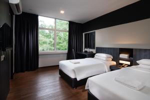 Кровать или кровати в номере Hotel Waterfall