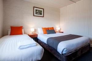 Postel nebo postele na pokoji v ubytování Silver Hills Motel