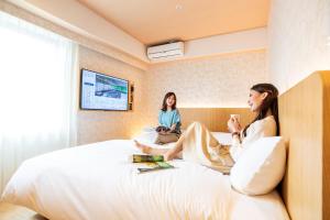Sjónvarps- og/eða afþreyingartæki á Daiwa Roynet Hotel Nagoya Fushimi