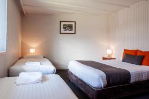 Postel nebo postele na pokoji v ubytování Silver Hills Motel