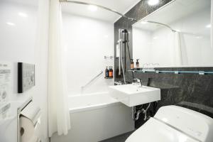 Baðherbergi á Daiwa Roynet Hotel Nagoya Fushimi