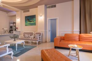 Posezení v ubytování PALMA city HOTEL
