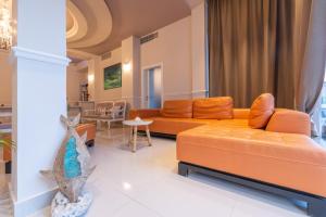 Posezení v ubytování PALMA city HOTEL