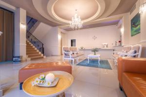 Posezení v ubytování PALMA city HOTEL