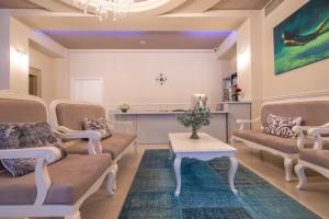 Posezení v ubytování PALMA city HOTEL