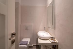 Koupelna v ubytování PALMA city HOTEL