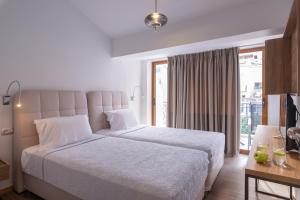 Postel nebo postele na pokoji v ubytování PALMA city HOTEL