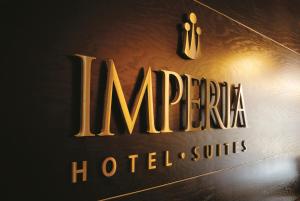 Certifikat, nagrada, znak ali drug dokument, ki je prikazan v nastanitvi Imperia Hotel & Suites Saint-Eustache