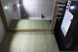 Et badeværelse på Kapuas Palace Hotel
