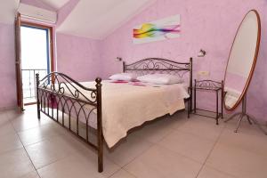 Posteľ alebo postele v izbe v ubytovaní Villa Pina in Makarska, private pool + 25 fotografií
