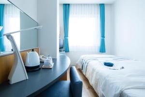 Postel nebo postele na pokoji v ubytování Hotel Flex