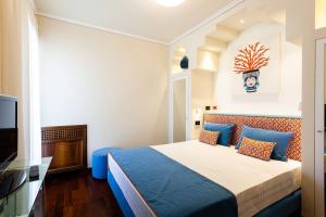 Ένα ή περισσότερα κρεβάτια σε δωμάτιο στο Villa Orlando +30 φωτογραφίες